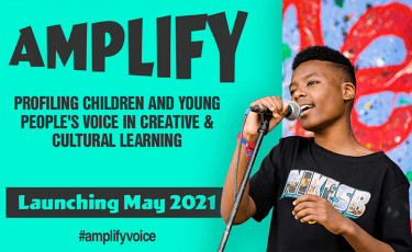 On the left of the image: Amplify logo followed by strapline 'Profiling children and young people's voice in creative and cultural learning' Launching May 2021 #amplifyvoice opposite an image of a child singing into a microphone on the right of the image